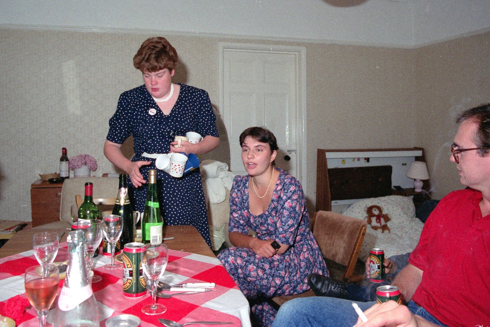 Uni: A Wyndham Square Economics Party, Stonehouse, Plymouth - 10th July 1989: Kate brings a load of mugs out