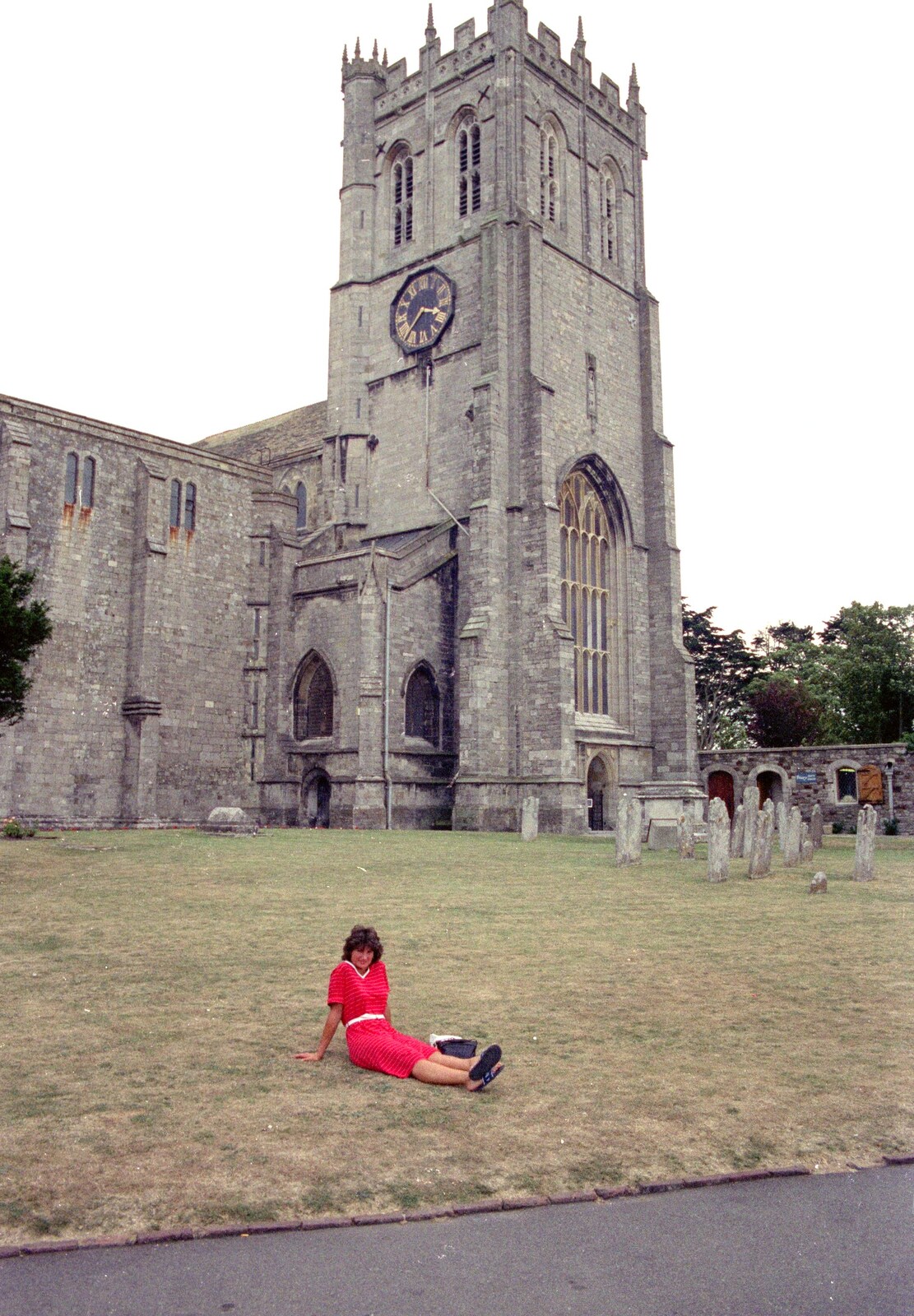 Angela on the lawn in front of Christchurch Priory from Back from Uni: Yarmouth, Alum Bay and Barton-on-sea, Hampshire - 23rd July 1989