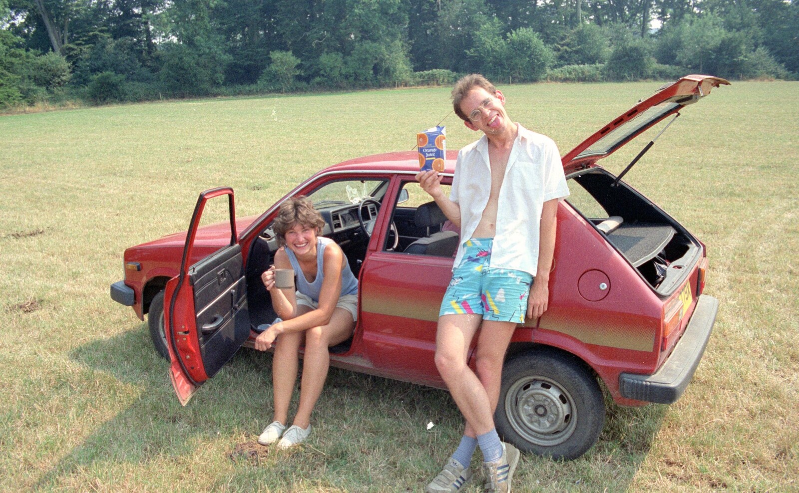Angela sits in her car as Phil slurps from Back From Uni: Summer Pruning, Bransgore, Dorset - 25th July 1989