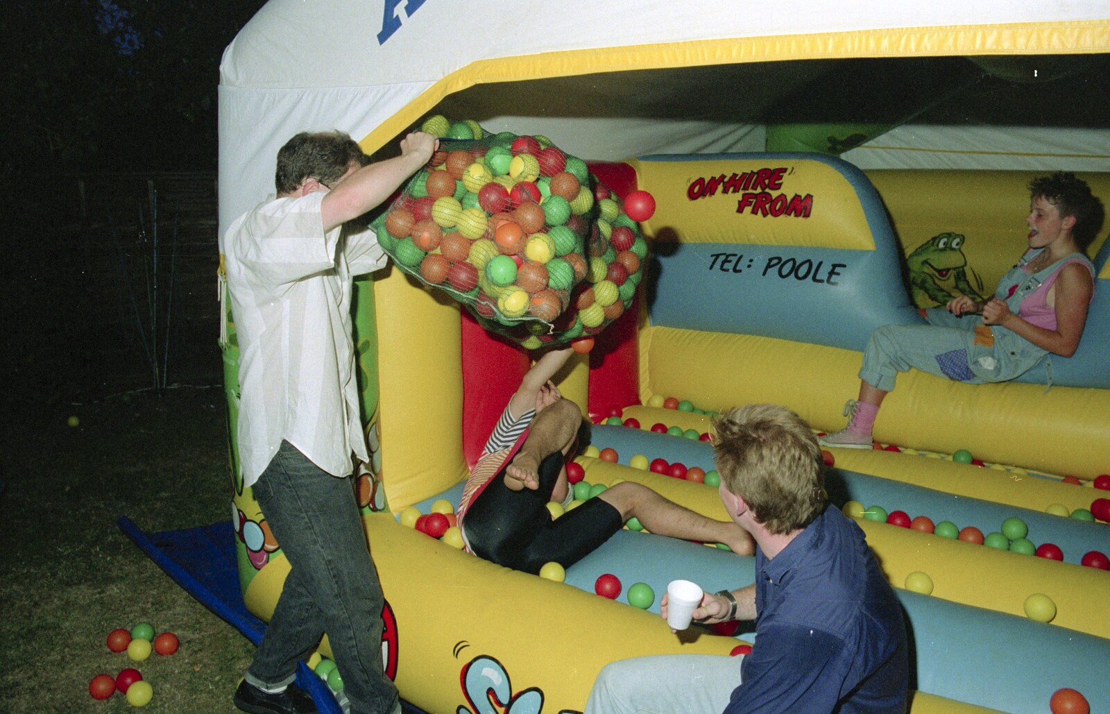 Chris and Phil's Party, Hordle, Hampshire - 6th September 1989: Hamish adds a few more balls to the bouncy castle