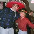 Steve and Brenda try some random hats on, A Stuston Bonfire Night, Suffolk - 5th November 1989