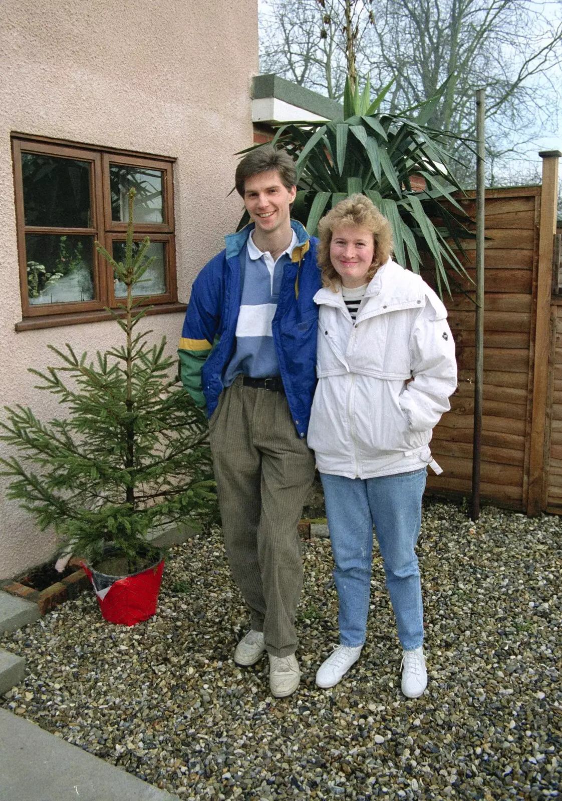 Sean and Maria, and a forlorn Christmas Tree, from New Year's Eve and Everyone Visits, Stuston, Suffolk - 10th January 1990