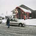1990 Snow whirls around Membury Services on the M4
