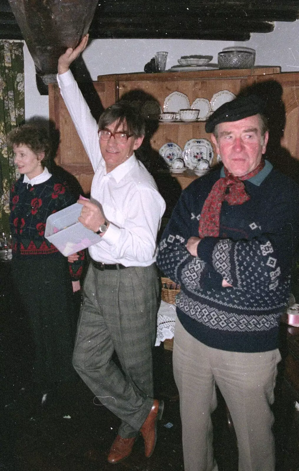 Derek pauses to prop the farmhouse up, from Pancake Day in Starston, Norfolk - 27th February 1990