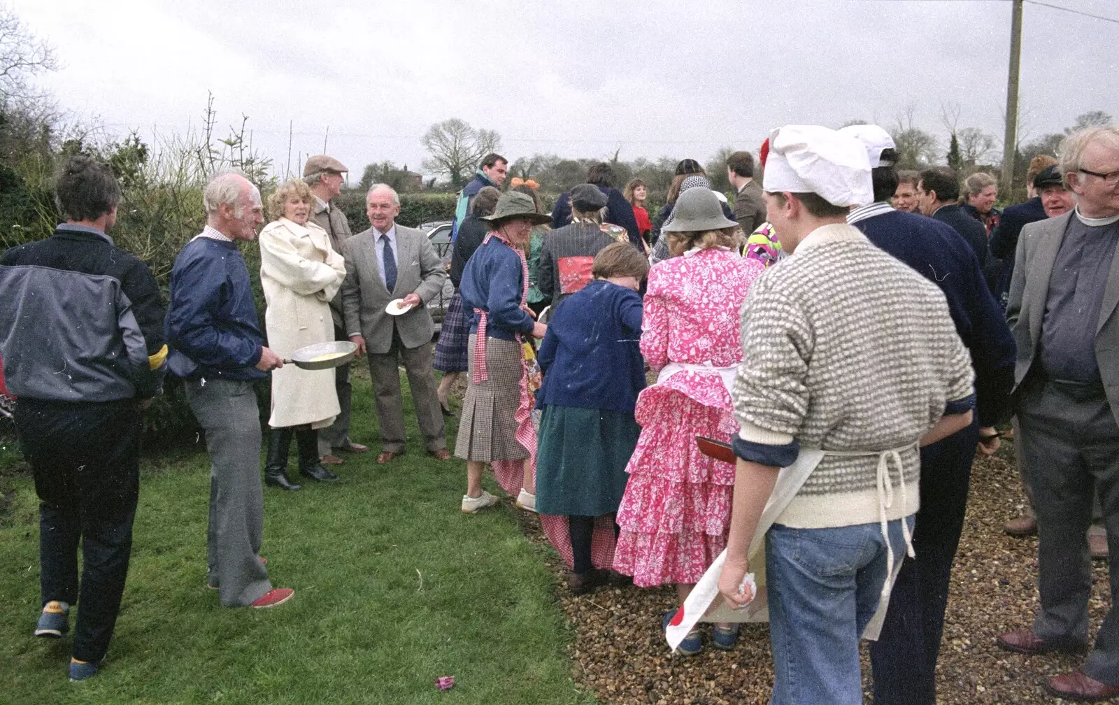 The pancakers mill around outside, from Pancake Day in Starston, Norfolk - 27th February 1990