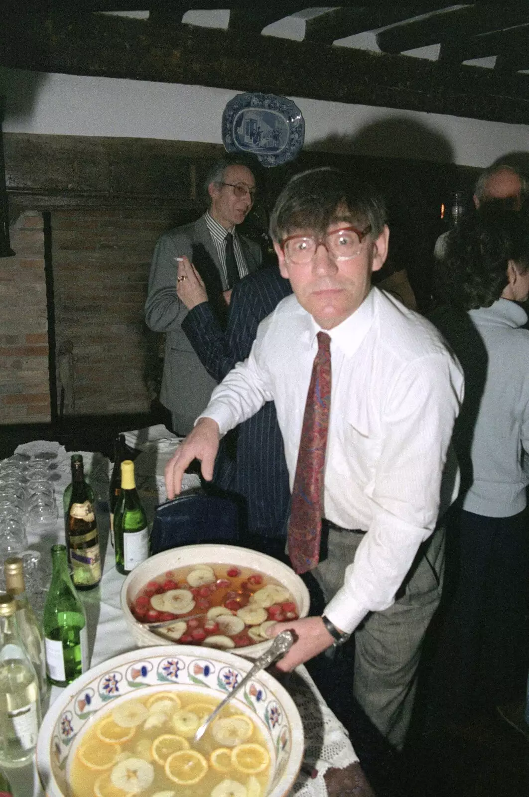 Derek checks the punch, from Pancake Day in Starston, Norfolk - 27th February 1990