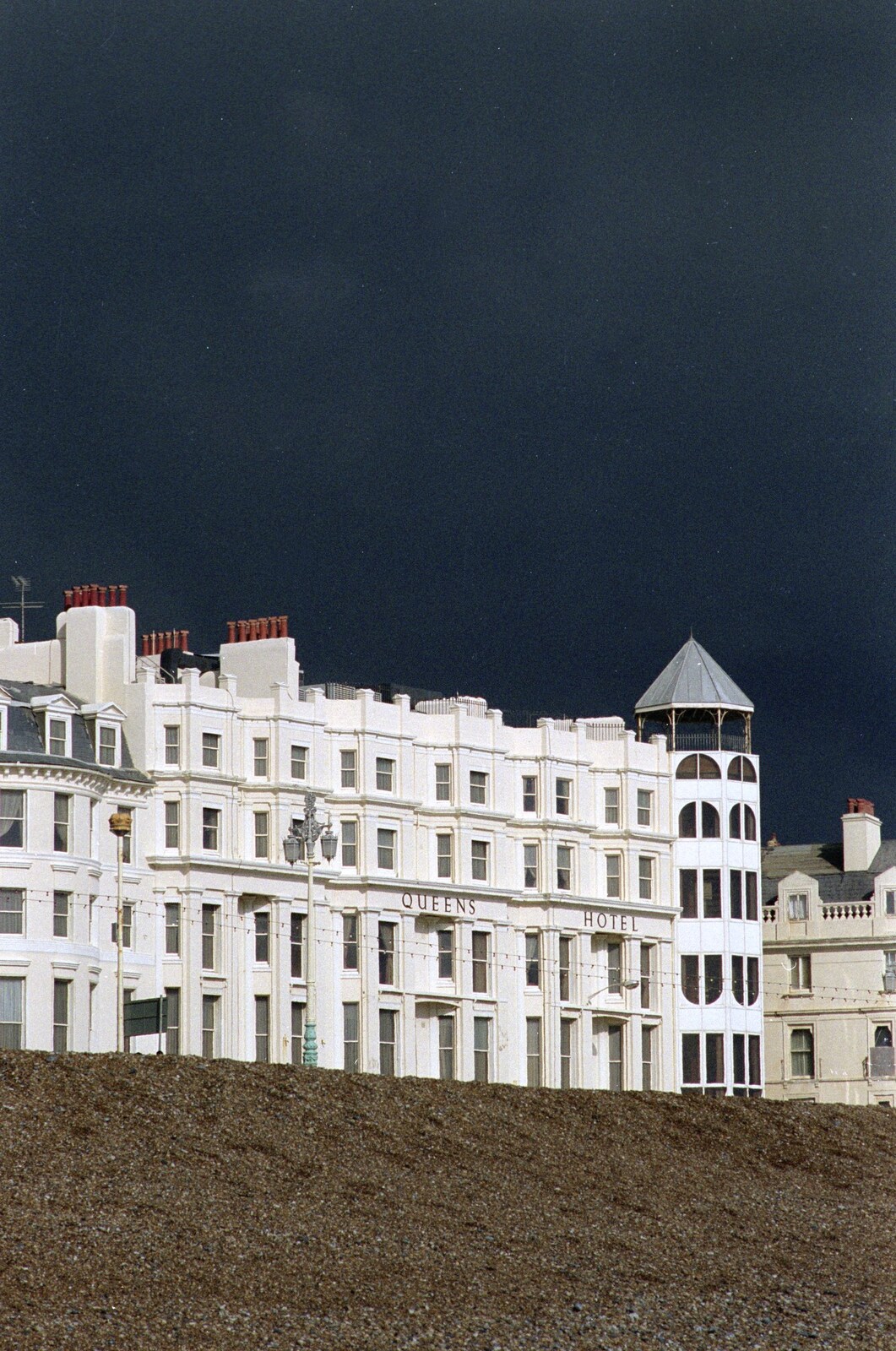 The Queens Hotel, and some dark skies from Brighton Rock: Visiting Riki and John, Brighton, East Sussex - 5th March 1990