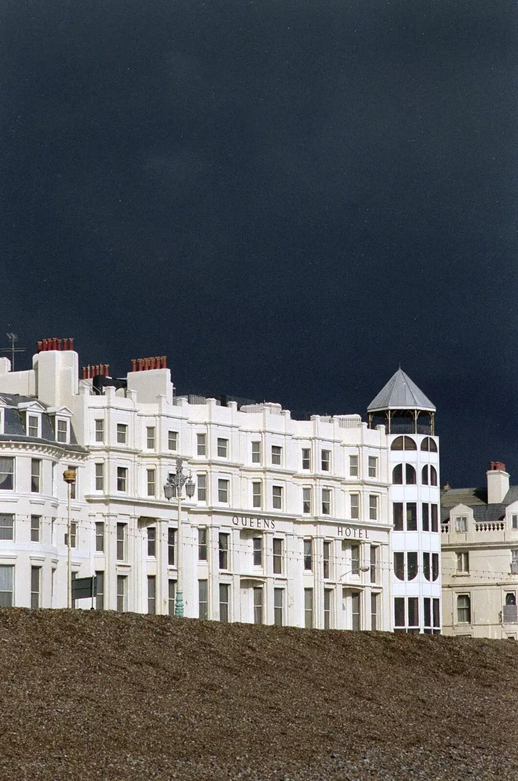 The Queens Hotel, and some dark skies, from Brighton Rock: Visiting Riki and John, Brighton, East Sussex - 5th March 1990