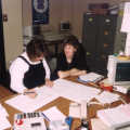 Wendy Saunders and Brenda Pitcher examine some printouts