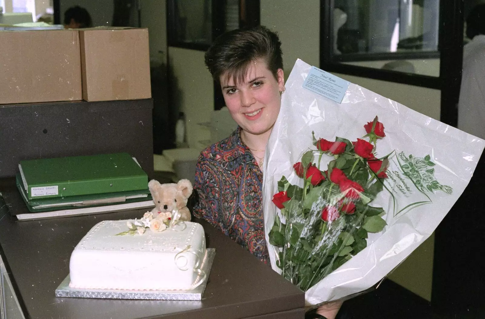 Kelly gets a birthday cake and some flowers, from Kelly's Printec Birthday, Roydon, Norfolk - 2nd May 1990