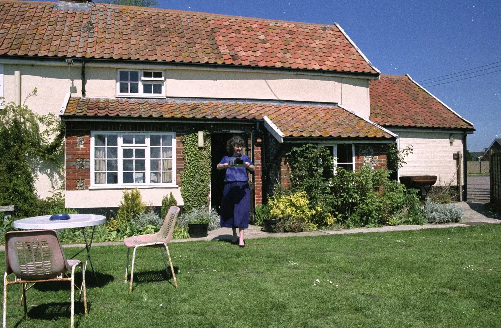 Brenda comes out with drinks, from Kelly's Printec Birthday, Roydon, Norfolk - 2nd May 1990