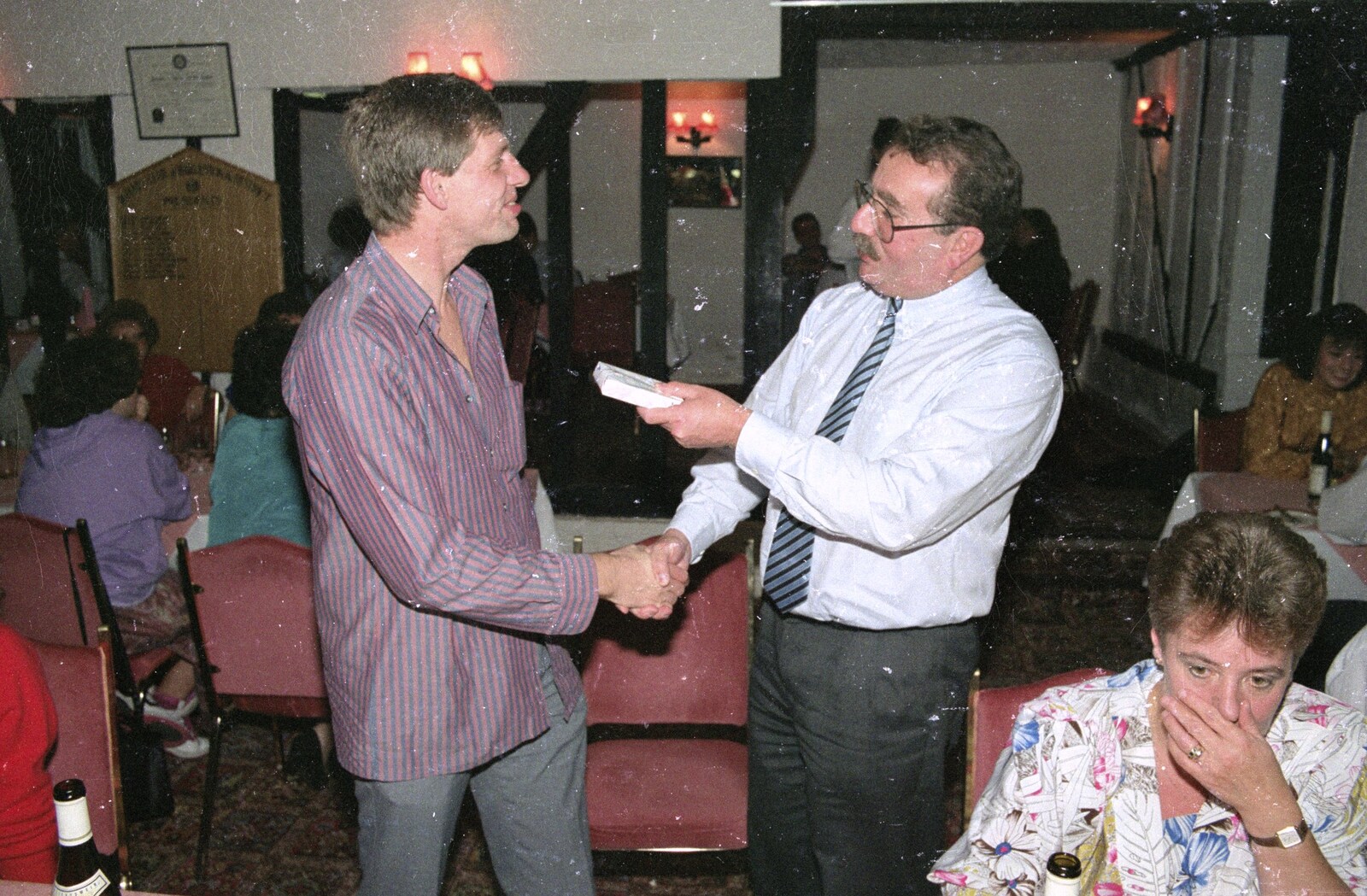 Brian hands over a birthday present from Printec and Steve-O's Pants, The Swan, Harleston, Norfolk - 19th May 1990