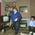 Sarah tidies up, An "Above The Laundrette" Barbeque, Diss, Norfolk - 28th May 1990