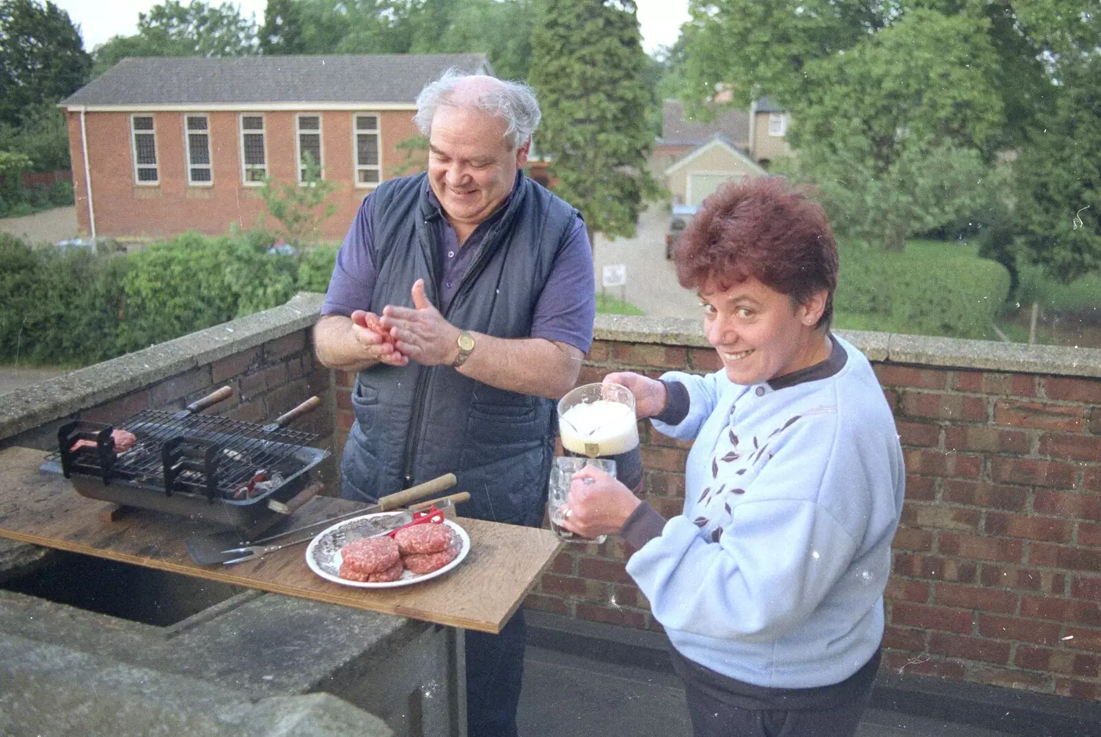 Crispy helps out by pouring a homebrew, from An "Above The Laundrette" Barbeque, Diss, Norfolk - 28th May 1990