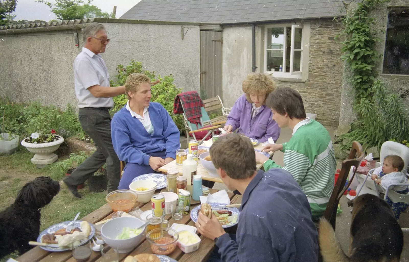 Bill roams around behind Gary, from A Trip To Huelgoat, Brittany, France - 11th June 1990