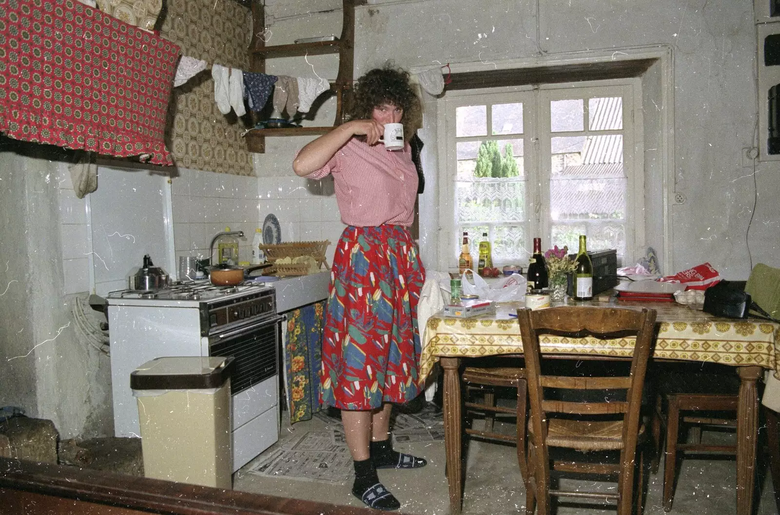 Angela has a cup of tea in the kitchen, from A Trip To Huelgoat, Brittany, France - 11th June 1990