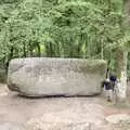 A woman has a go at the rock, A Trip To Huelgoat, Brittany, France - 11th June 1990