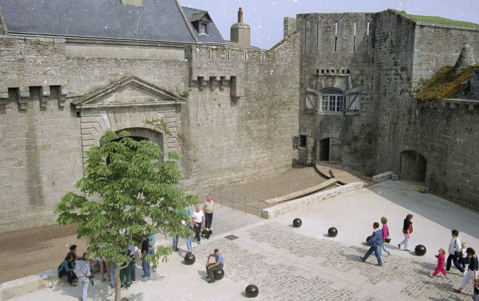 People mill around a square, from A Trip To Huelgoat, Brittany, France - 11th June 1990