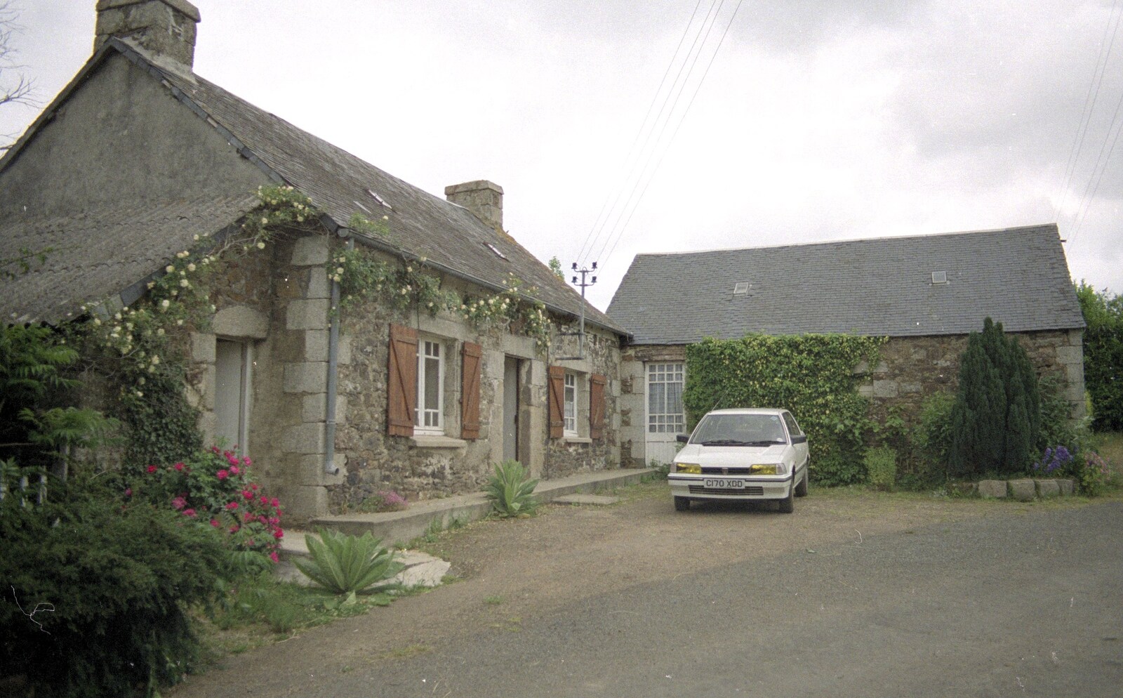 Angela's car, with yellow stickers on the headlights from A Trip To Huelgoat, Brittany, France - 11th June 1990