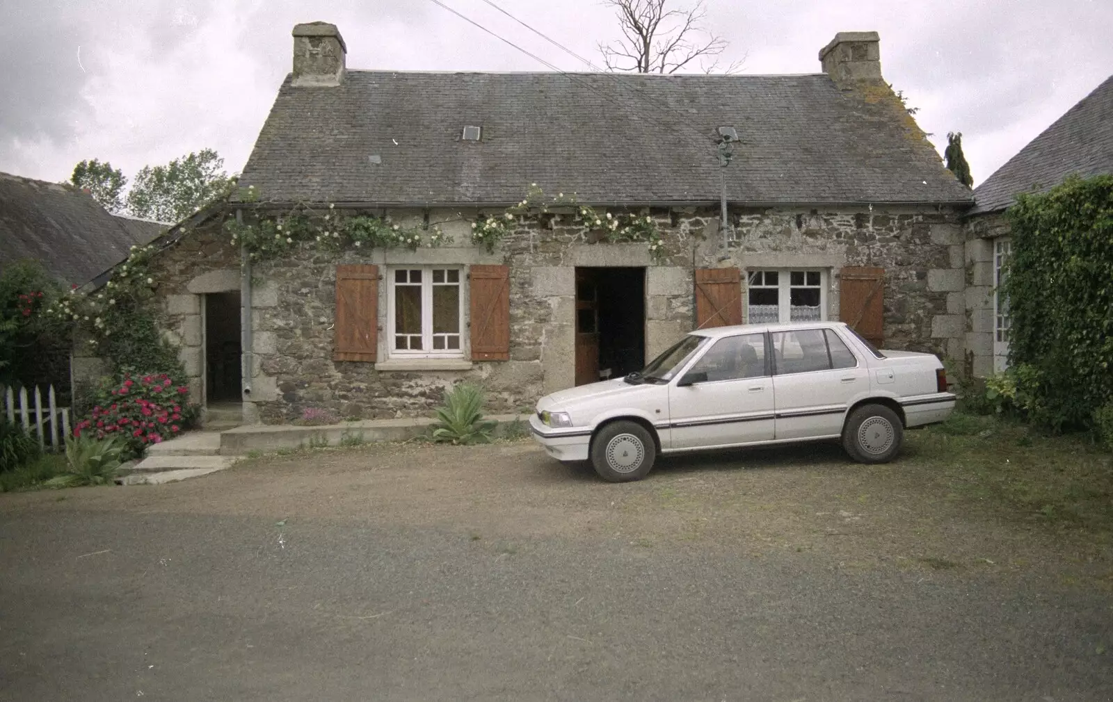 The car outside the cottage, from A Trip To Huelgoat, Brittany, France - 11th June 1990