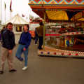 Rik and Jon mess around by a fairground ride