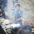1990 Bob Caley mans the barbeque