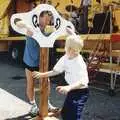 A small boy flings a wet sponge, BPCC Anglia Web Open Day, Diss, Norfolk - 23rd June 1990