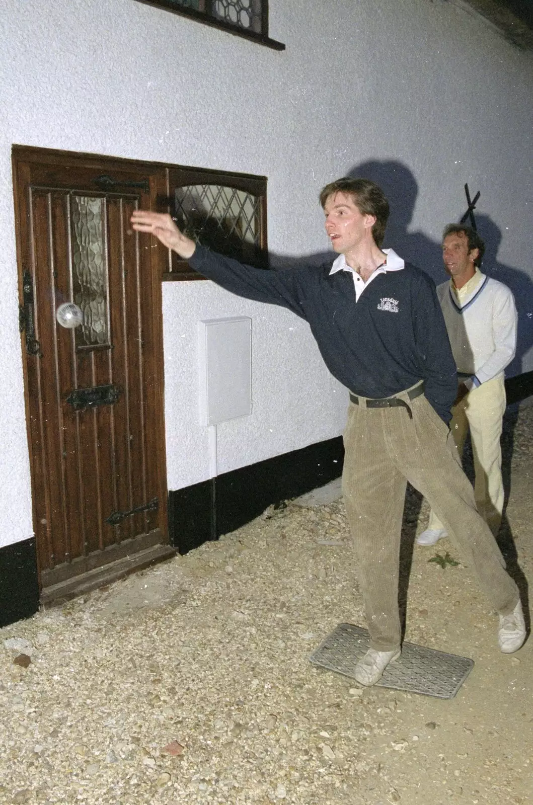 Sean's boule passes the front door, from Petanque At The Willows, Bransgore, Dorset - 10th July 1990