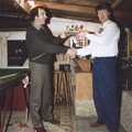 Mike presents a pool prize to Neil, Petanque At The Willows, Bransgore, Dorset - 10th July 1990