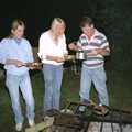 Sue's Fire Dance, Stuston, Suffolk - 21st July 1990, Bernie scoops beans out of a pan