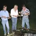 Bernie scoops beans out of a pan, Sue's Fire Dance, Stuston, Suffolk - 21st July 1990