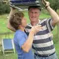 Bernie and Brenda take shelter under a chair, Sue's Fire Dance, Stuston, Suffolk - 21st July 1990