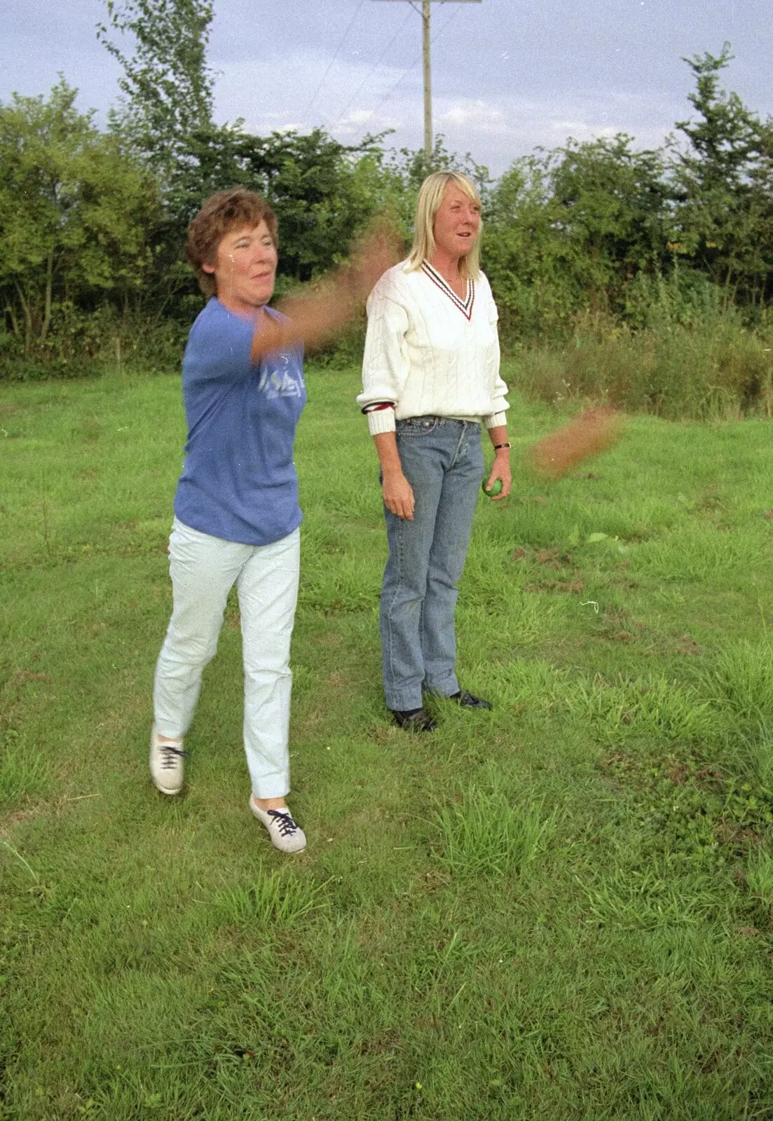 Brenda flings a horseshoe, from Sue's Fire Dance, Stuston, Suffolk - 21st July 1990