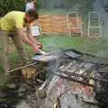 Geoff chucks some sausages on, Sue's Fire Dance, Stuston, Suffolk - 21st July 1990