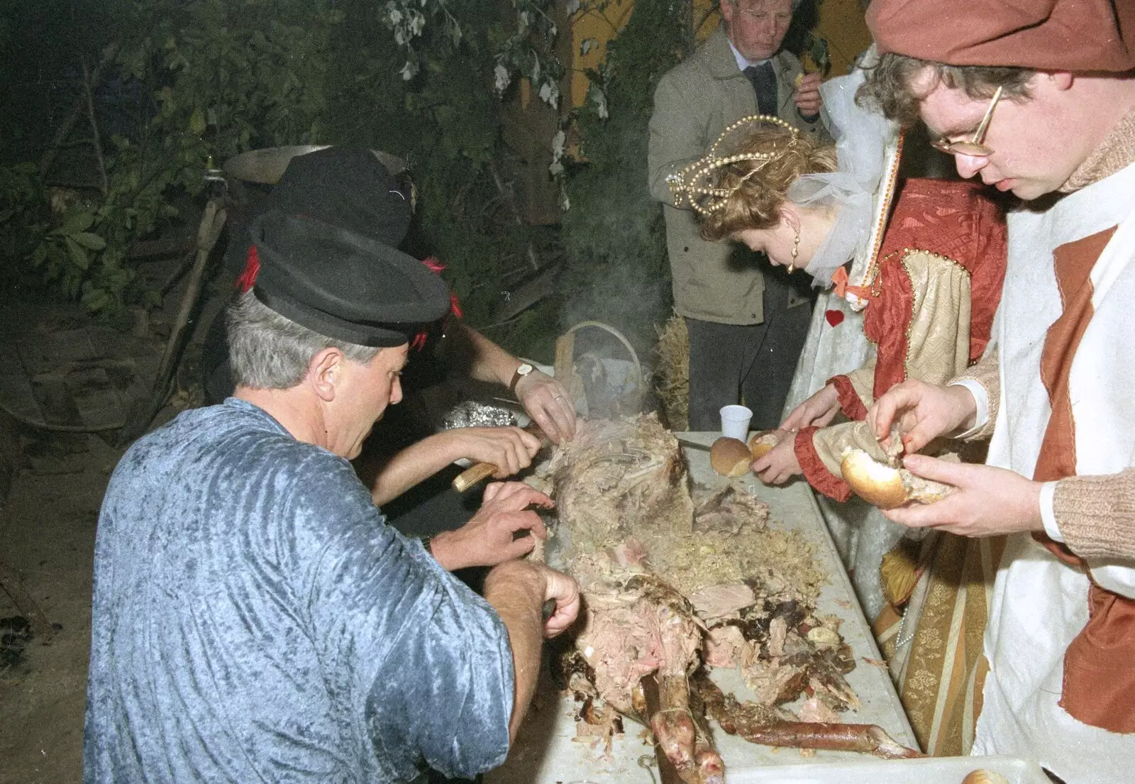 The slow-roast lamb is scoffed, from A Mediaeval Birthday Party, Starston, Norfolk - 27th July 1990