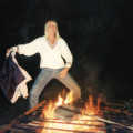 Sue's legendary fire dance - the flames fed from fat from the upturned cooking trays