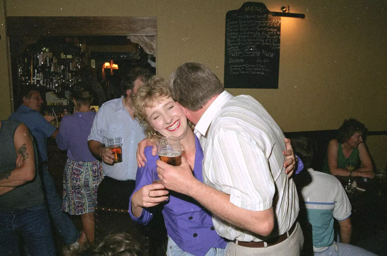 Kate gets a beery hug, from Stuston Sewerage and Kate's Printec Birthday, Scole Inn, Norfolk and Suffolk - 2nd August 1990