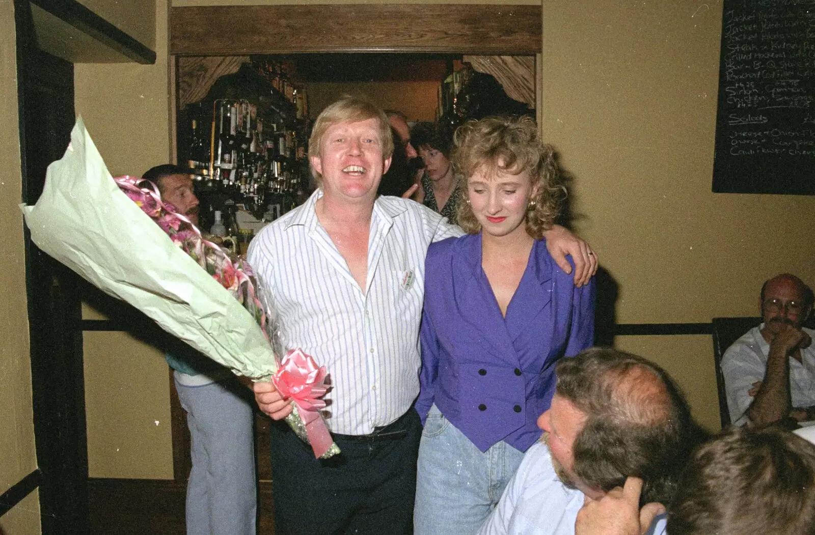 Alan Cox gives Kate some flowers, from Stuston Sewerage and Kate's Printec Birthday, Scole Inn, Norfolk and Suffolk - 2nd August 1990