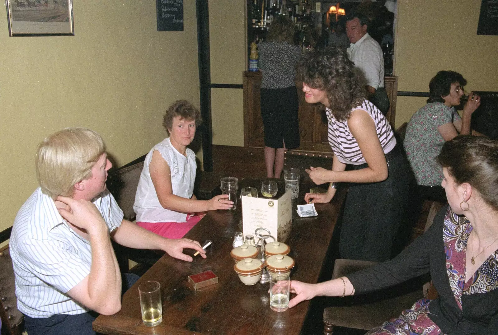 Rachel's getting the next round in, from Stuston Sewerage and Kate's Printec Birthday, Scole Inn, Norfolk and Suffolk - 2nd August 1990