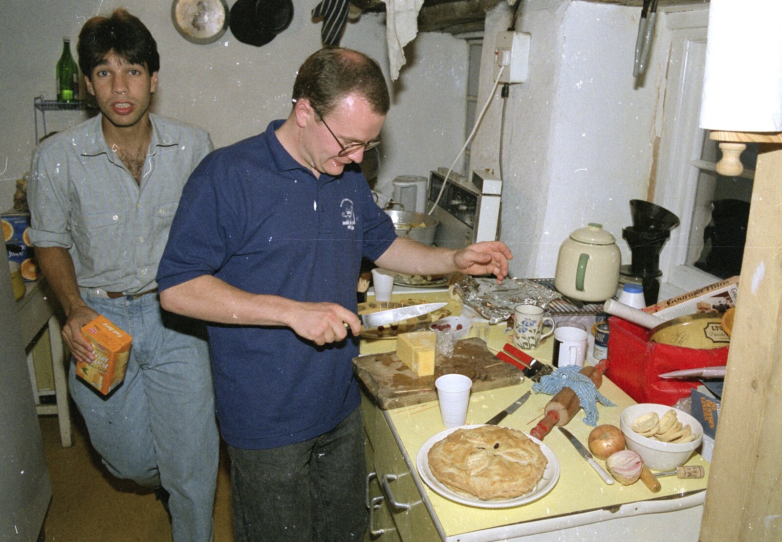 Liz's Party, Abergavenny, Monmouthshire, Wales - 4th August 1990: Hamish chops up some cheese