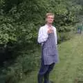 Nosher in a kitchen apron and wellies, Liz's Party, Abergavenny, Monmouthshire, Wales - 4th August 1990