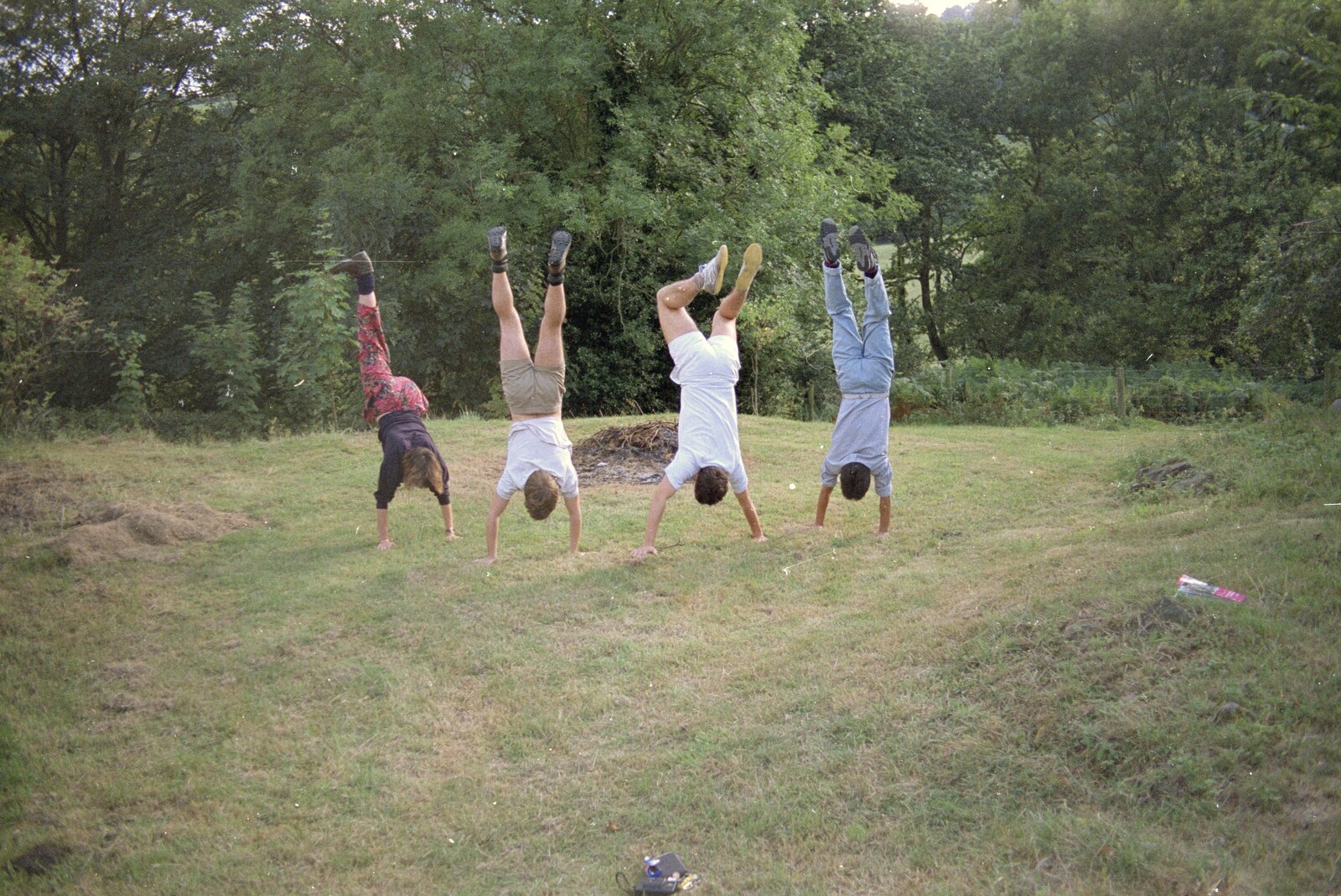 Liz's Party, Abergavenny, Monmouthshire, Wales - 4th August 1990: Four hand-standers in a row