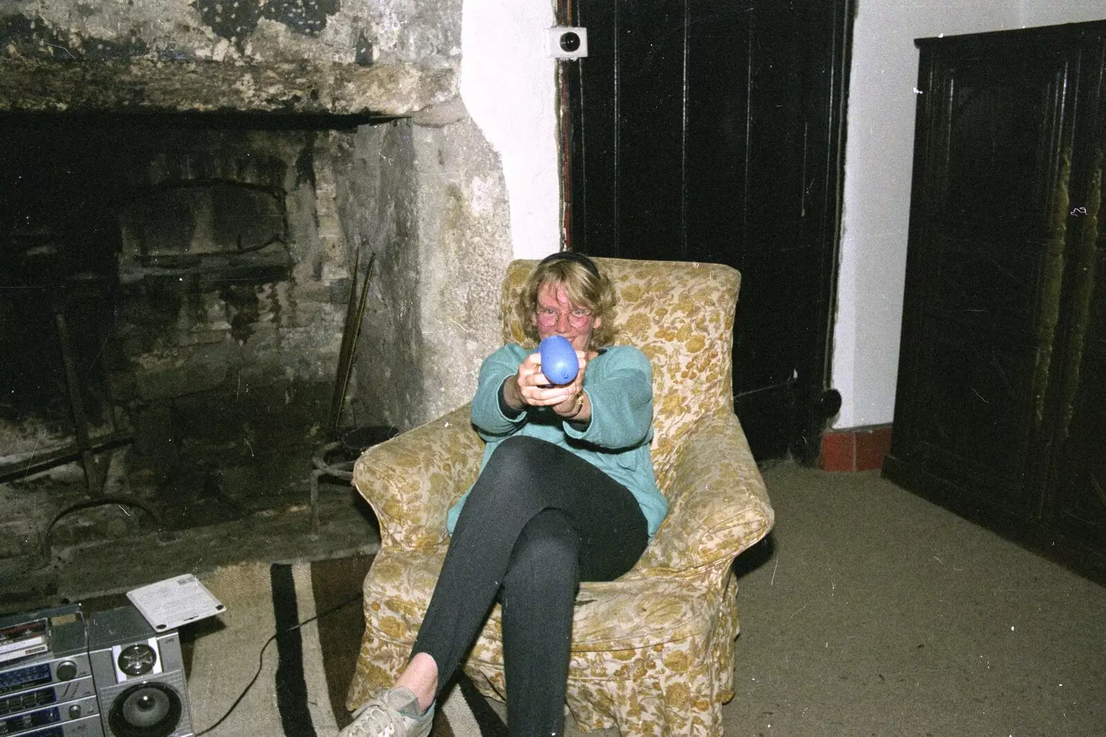 Liz points a water balloon, from Liz's Party, Abergavenny, Monmouthshire, Wales - 4th August 1990