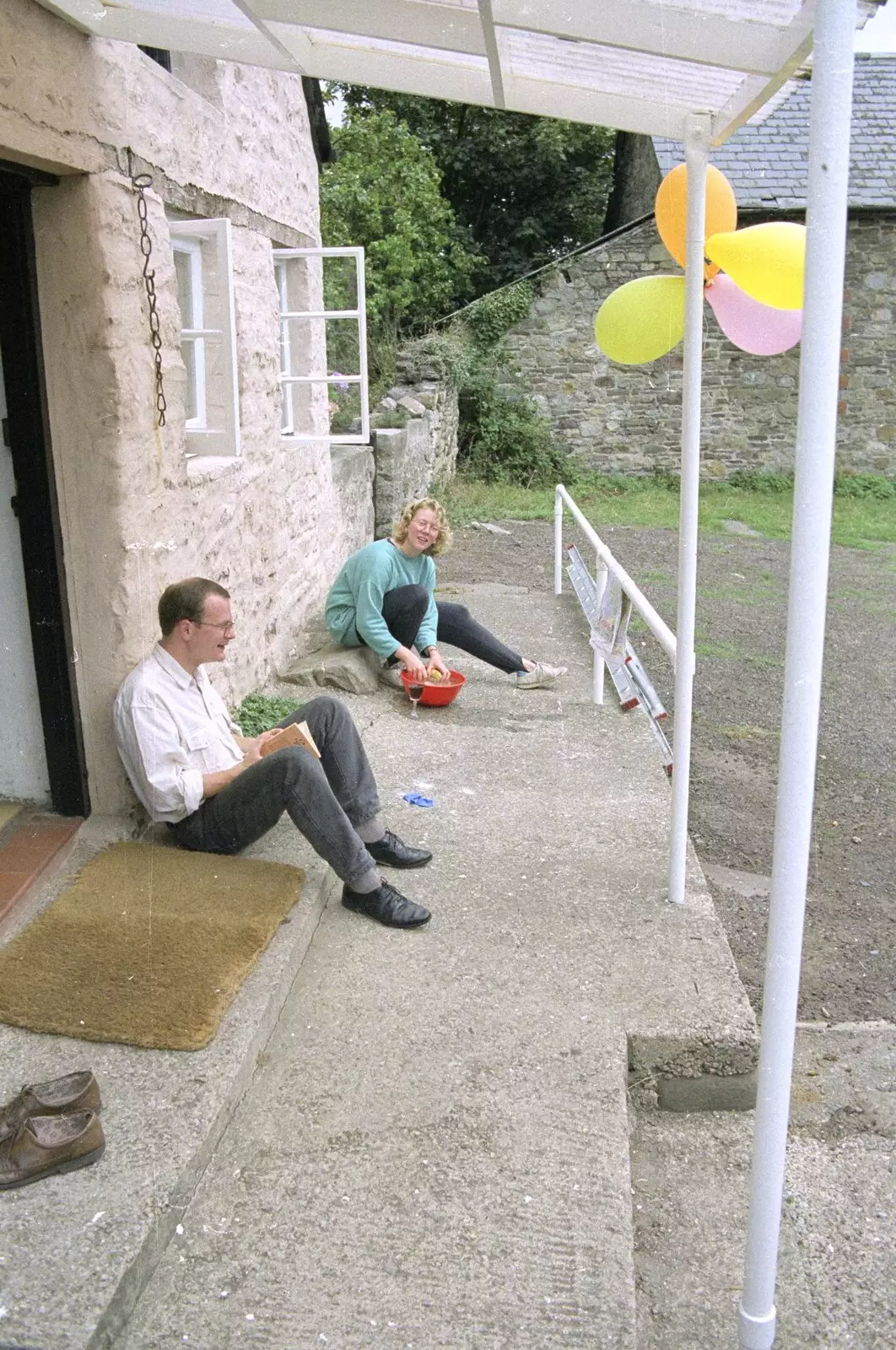 Hamish does some reading as Liz carries on peeling, from Liz's Party, Abergavenny, Monmouthshire, Wales - 4th August 1990