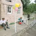 Hamish reads whilst Liz peels potatoes, Liz's Party, Abergavenny, Monmouthshire, Wales - 4th August 1990