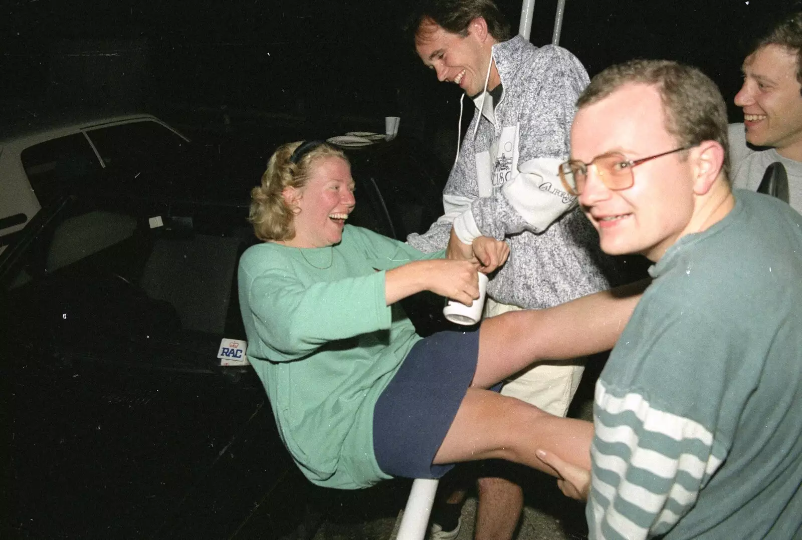 Phil and Hamish pretend to throw Liz over the fence, from Liz's Party, Abergavenny, Monmouthshire, Wales - 4th August 1990