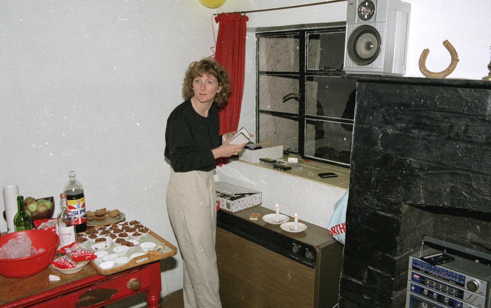Liz's Party, Abergavenny, Monmouthshire, Wales - 4th August 1990: The DJ checks her tapes (yes, cassette tapes)
