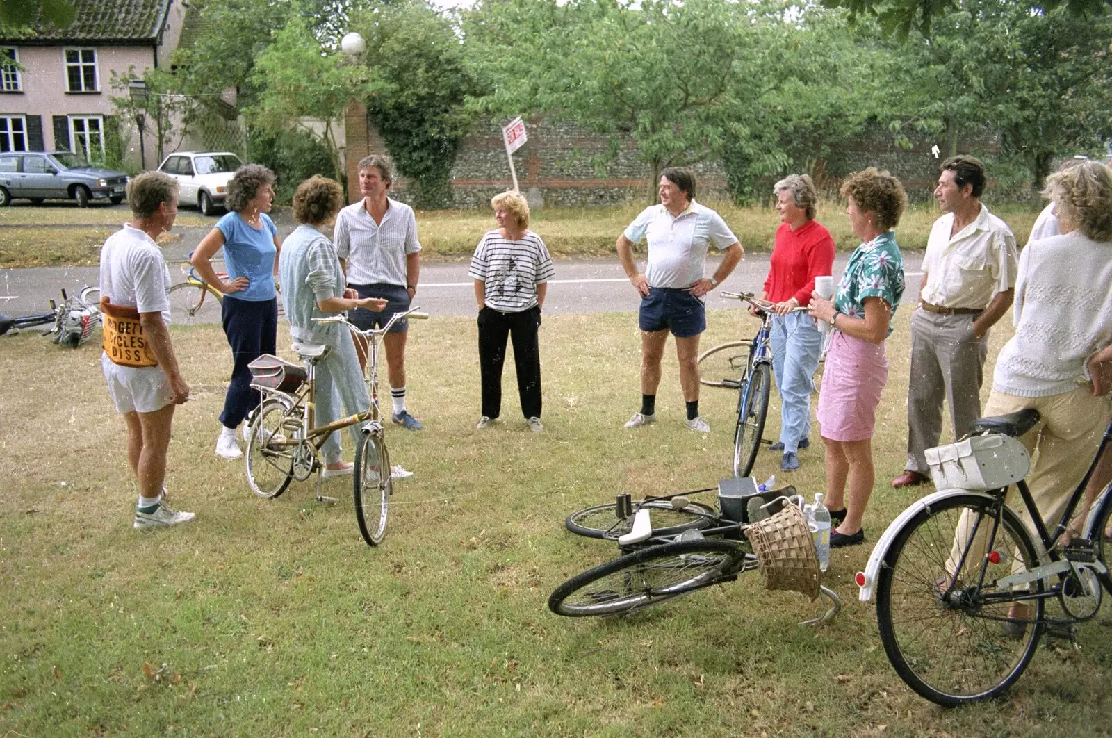 The cyclists catch their breath on Redgrave green, from A Bike Ride to Redgrave, Suffolk - 11th August 1990