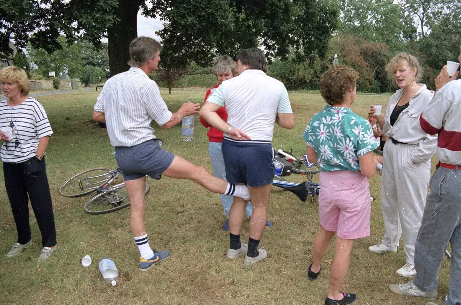 Geoff gives Corky a boot up the arse, from A Bike Ride to Redgrave, Suffolk - 11th August 1990