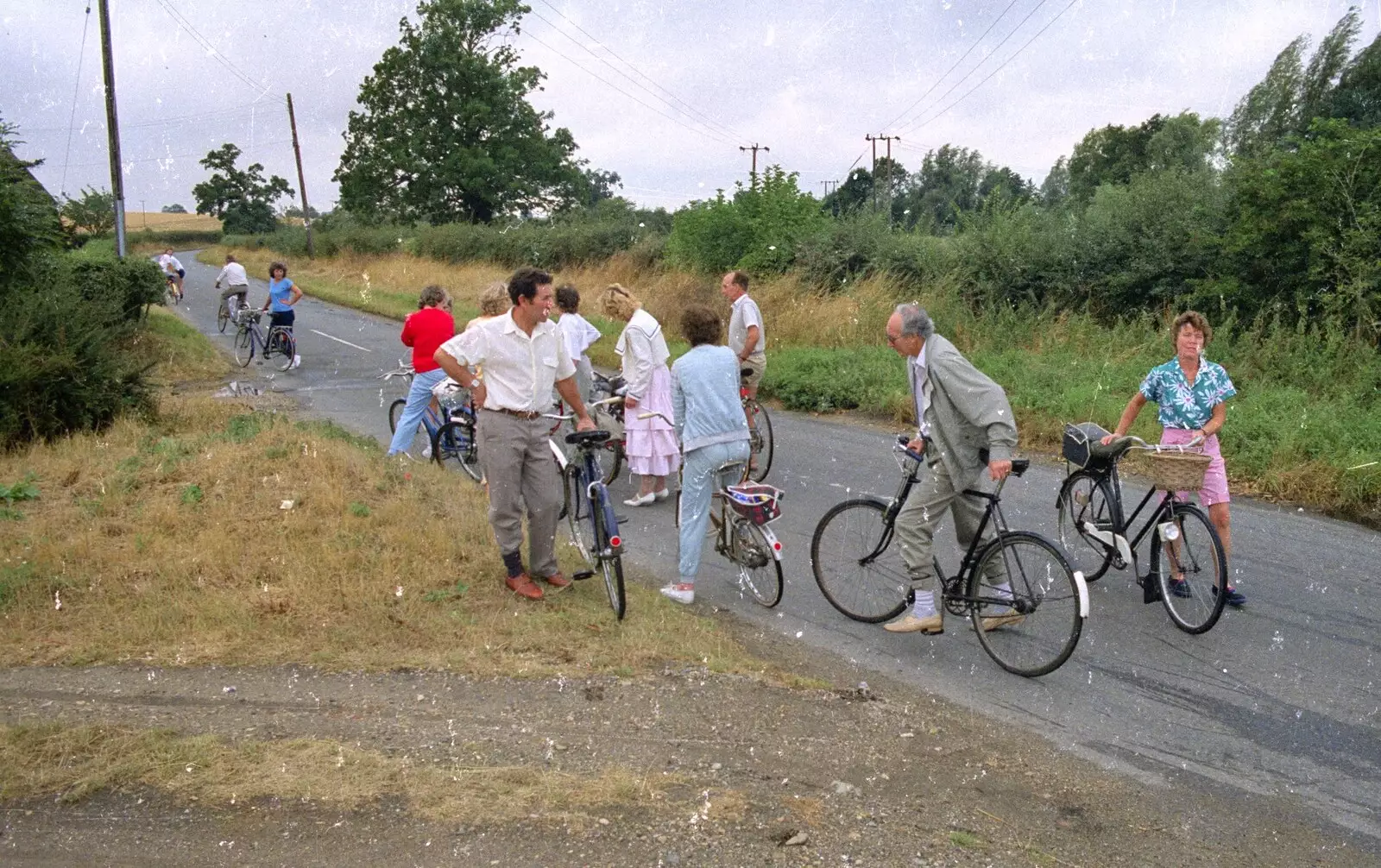 Pausing on the back road to Wortham, near Fair Green in Diss, from A Bike Ride to Redgrave, Suffolk - 11th August 1990